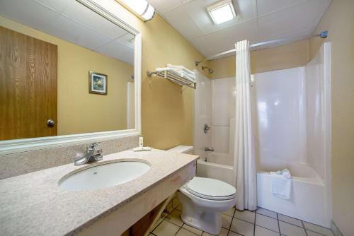 a bathroom with a sink and a toilet and a shower at Quality Inn Near Six Flags St. Louis in Pacific