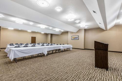 a large room with rows of tables and chairs at Comfort Inn & Suites Crystal Inn Sportsplex in Gulfport