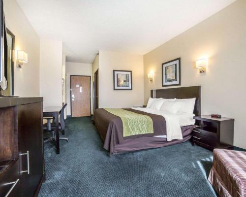 A bed or beds in a room at FairBridge Inn & Suites Glendive