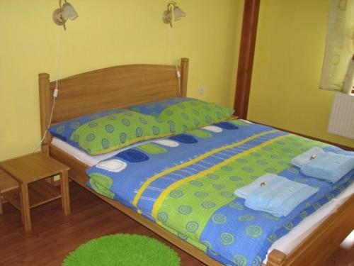 Łóżko lub łóżka w pokoju w obiekcie Penzion-In