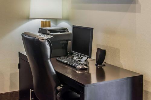 an office with a computer and a printer on a desk at Sleep Inn Matthews-Charlotte in Charlotte