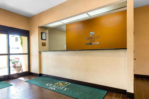 a lobby with a vanity mirror and a welcome mat at Quality Inn West of Asheville in Canton