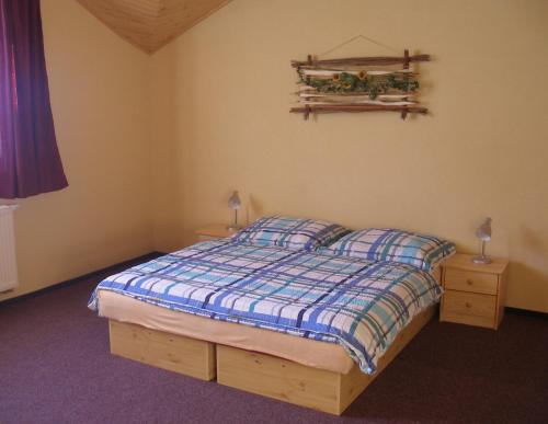 Ένα ή περισσότερα κρεβάτια σε δωμάτιο στο Skipension Jasná