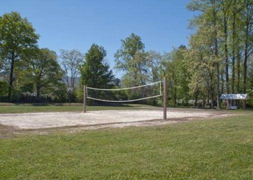 a volleyball net in the middle of a field at Quality Inn Andrews in Andrews
