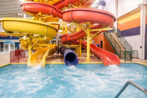 a large water slide in a swimming pool at Sleep Inn & Suites Conference Center and Water Park in Minot