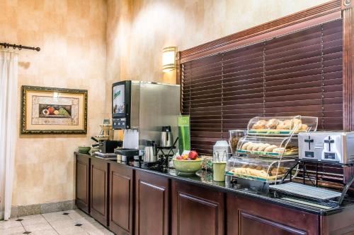 a kitchen with a counter with some food on it at Quality Inn Hackettstown - Long Valley in Hackettstown