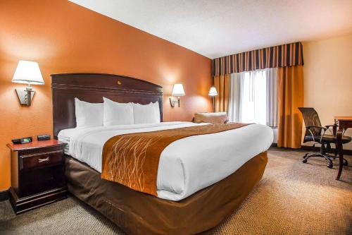 a bedroom with a large bed in a hotel room at Comfort Inn & Suites Somerset - New Brunswick in Somerset