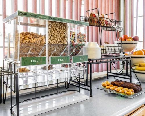 a display case filled with lots of different types of food at Rodeway Inn Elko Downtown Area in Elko