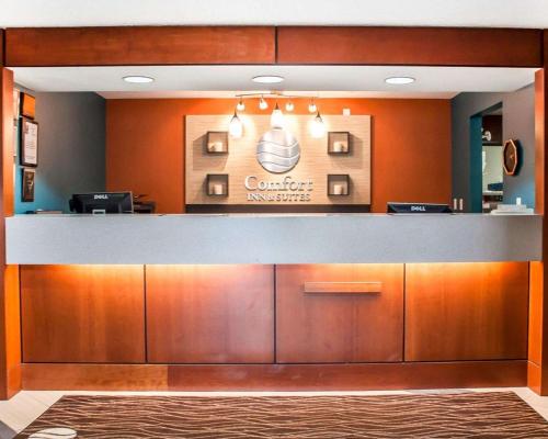a lobby with a counter in a dental office at Comfort Inn & Suites Hamburg - Buffalo South in Hamburg