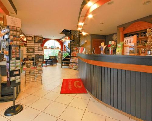 Restoran atau tempat lain untuk makan di Econo Lodge at the Falls North