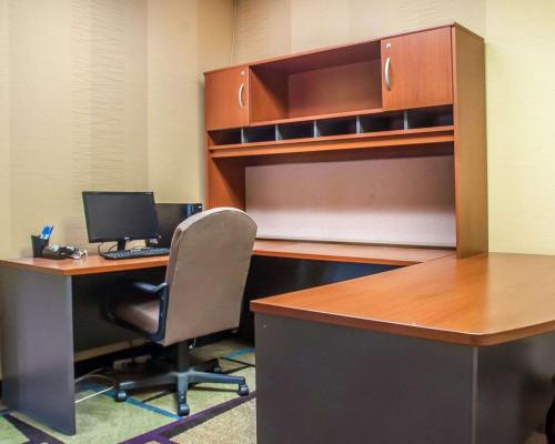 an office with a desk with a computer and a chair at Comfort Inn & Suites Hamburg - Buffalo South in Hamburg