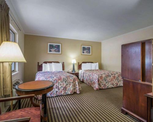 Postel nebo postele na pokoji v ubytování Kingston Motel