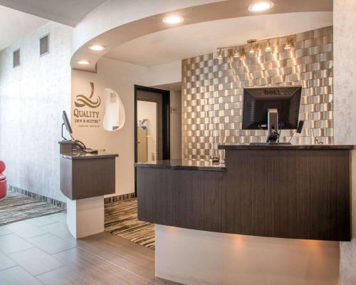 a lobby of a dental office with a reception desk at Quality Inn & Suites North-Polaris in Worthington