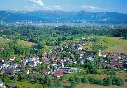 an aerial view of a small town with a lake at Gasthof Ziegler Hotel & Restaurant in Lindau
