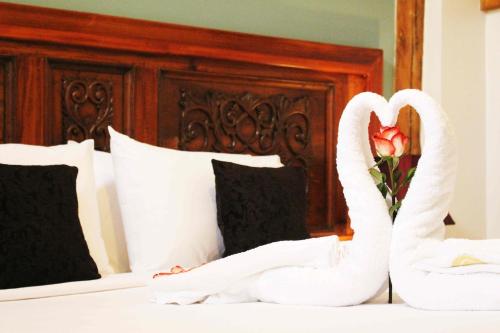 Postel nebo postele na pokoji v ubytování Casa Joaquin Boutique Hotel