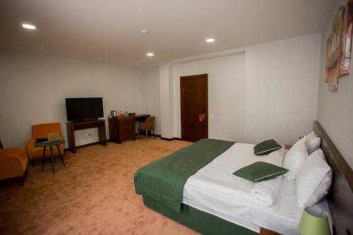 Ένα ή περισσότερα κρεβάτια σε δωμάτιο στο Da Vinci Boutique Hotel