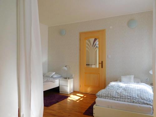 Postel nebo postele na pokoji v ubytování Apartmány Ruprechtov