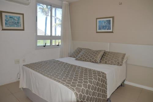 Кровать или кровати в номере Beach Temporada