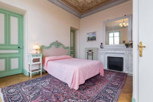 Postel nebo postele na pokoji v ubytování Résidence La Villa Léonie