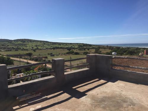 a view of the countryside from the balcony of a house at Aziki in Essaouira