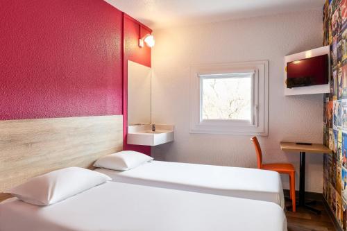 Katil atau katil-katil dalam bilik di hotelF1 Paris Porte de Châtillon