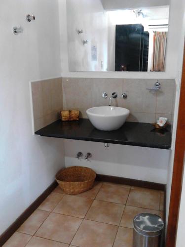 Un baño de Si Mi Capitán - Cabañas & Habitaciones