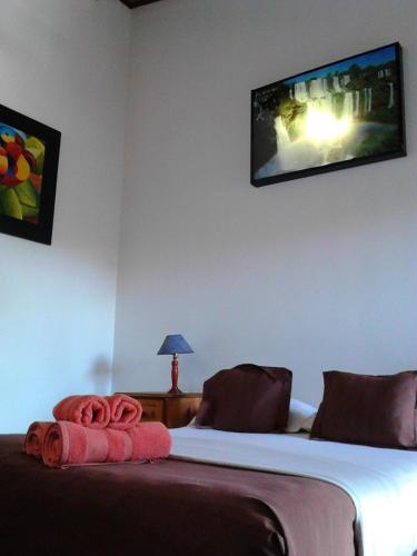 Cama o camas de una habitación en Si Mi Capitán - Cabañas & Habitaciones