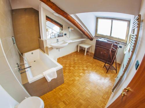 an overhead view of a bathroom with a sink and a toilet at Artua'&Solferino in Turin