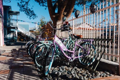 a group of bikes parked next to a fence at The Hostel California in Bishop
