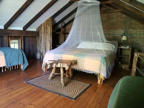Cama o camas de una habitación en Tacuapí Lodge