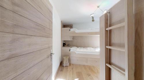 Poschodová posteľ alebo postele v izbe v ubytovaní Murtel 4 - Sils-Maria