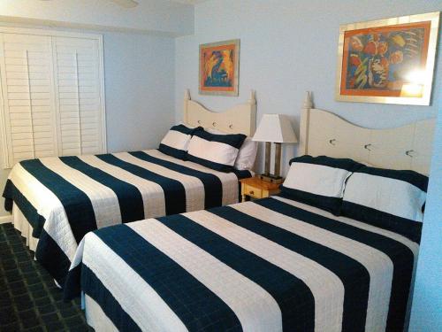 Katil atau katil-katil dalam bilik di Ocean Walk Resort 508