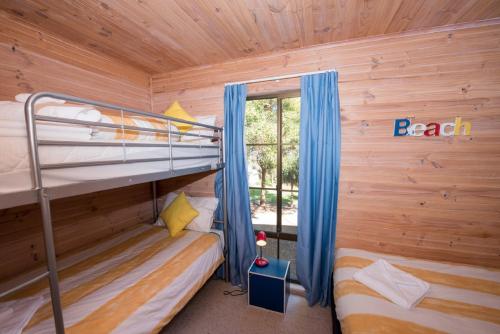 A bunk bed or bunk beds in a room at Redbill Beach Retreat