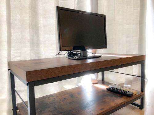 Televisyen dan/atau pusat hiburan di Yoyogi Apartment 2-301