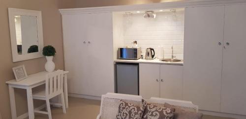 Kuchyň nebo kuchyňský kout v ubytování Mulberry Place