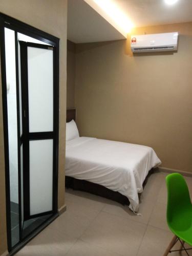 Postel nebo postele na pokoji v ubytování Asiago Hotel