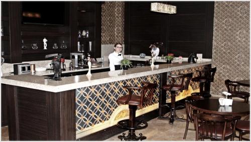 Lounge atau bar di Grand Asya Hotel