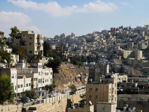 a view of a city with buildings at Cliff Hostel in Amman