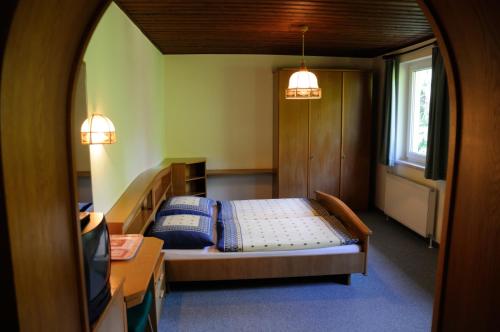 Postel nebo postele na pokoji v ubytování Strandhotel