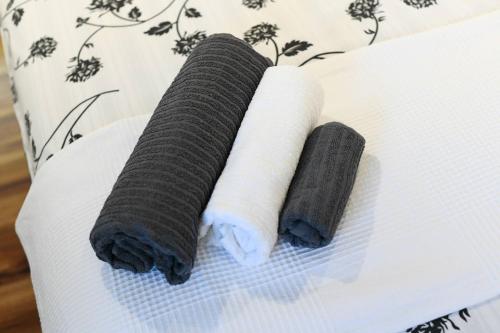 two rolls of yarn sitting on top of a table at "Oasis of Peace Zagreb-Apartments" in Zagreb