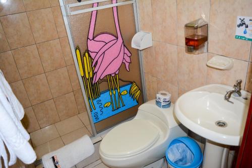 Kylpyhuone majoituspaikassa Hotel Coloma Galapagos