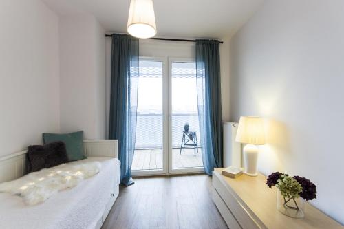 Posteľ alebo postele v izbe v ubytovaní Nowy Apartament Atal Tower - Garaż - Taras Widokowy - Centrum