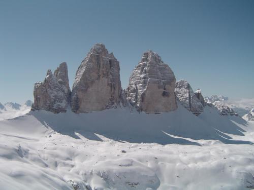 a group of large rocks in the snow at Chalet Heidi in Kartitsch