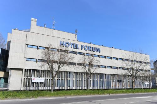 a building with a hotel fürkun written on it at Hotel Forum in SantʼIlario dʼEnza