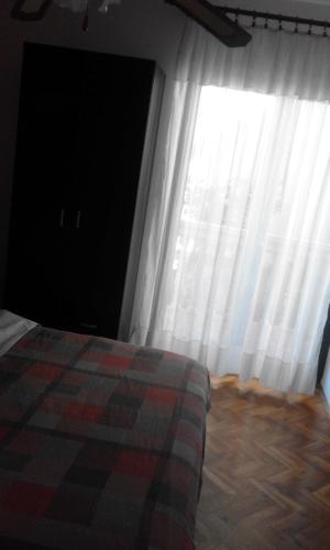 Cama o camas de una habitación en Apartments Ratković