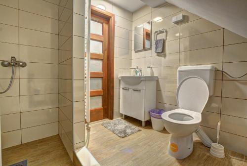 Vonios kambarys apgyvendinimo įstaigoje Apartmani Zeravica Jahorina