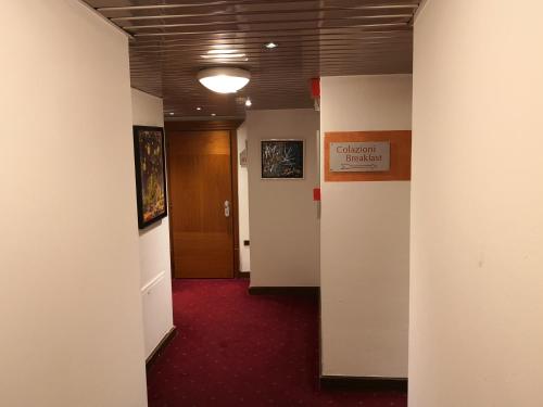 an office hallway with a hallway at HR Hotel in Monfalcone