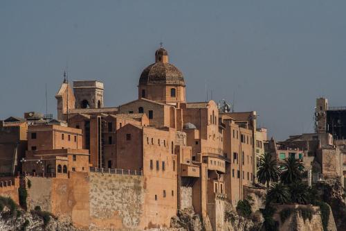 an old building on the side of a mountain at B&B la Bitta in Cagliari