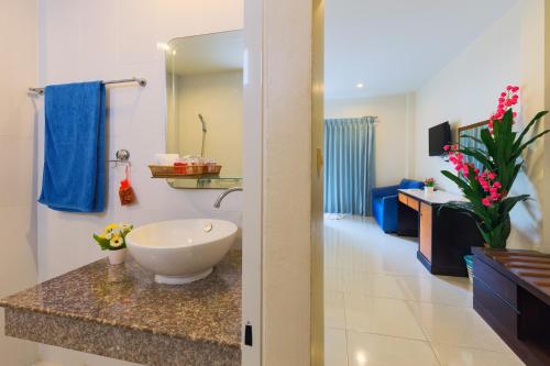 Kylpyhuone majoituspaikassa Kasemsuk Guesthouse SHA Extra plus