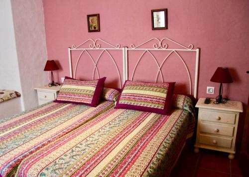 Postel nebo postele na pokoji v ubytování Hostal El Espinel